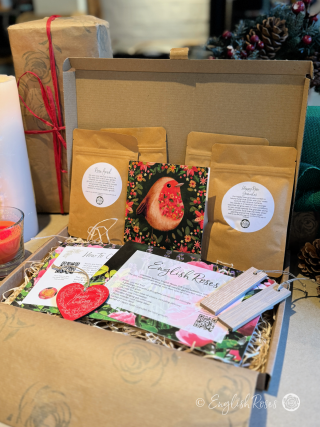 English Roses Christmas Letterbox Gift Two Rose Gift Box with a greetings card with gift code, help guides, rose feed, rose granules and gift tags.