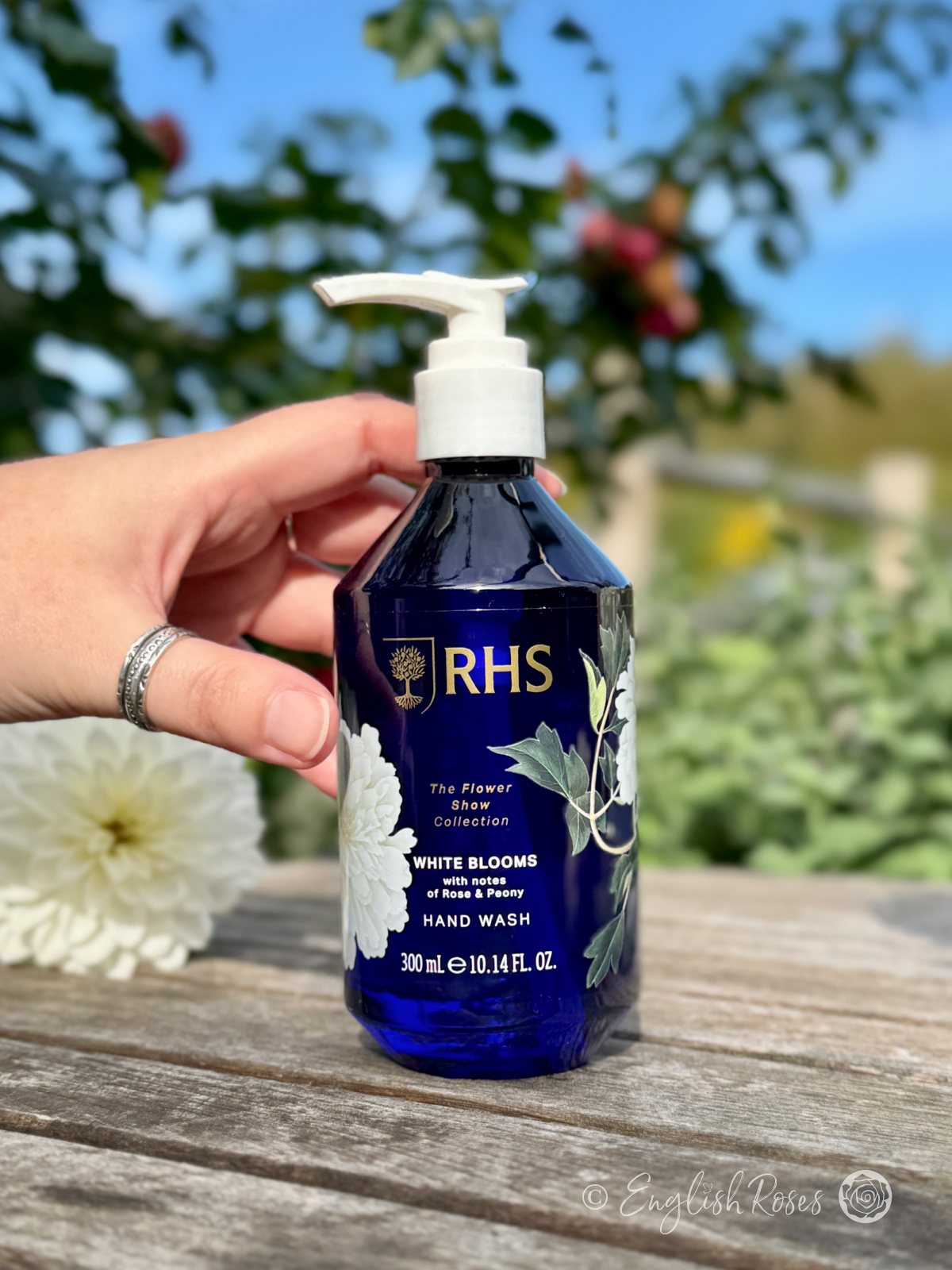 Hand Wash - White Blooms Rose and Peony RHS The Flower Show Collection - A hand holding the decorative hand wash