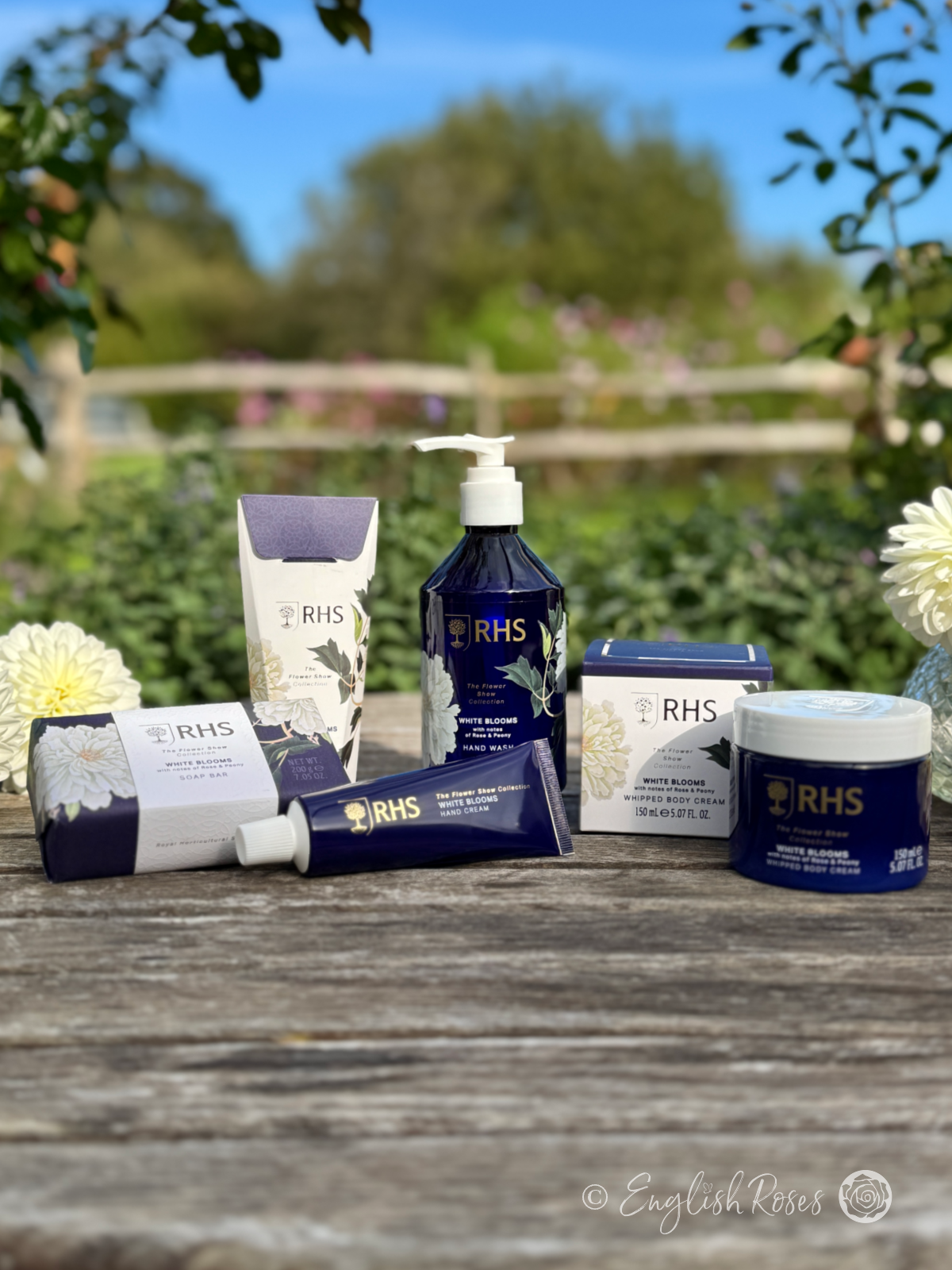 RHS The Flower Show Collection Gardener's Skin Care Range - Close up of the RHS Flower Show Collection White Blooms (Rose and Peony) Gardener's Skin Care - Soap Bar, Hand Cream, Hand Wash and Body Cream.