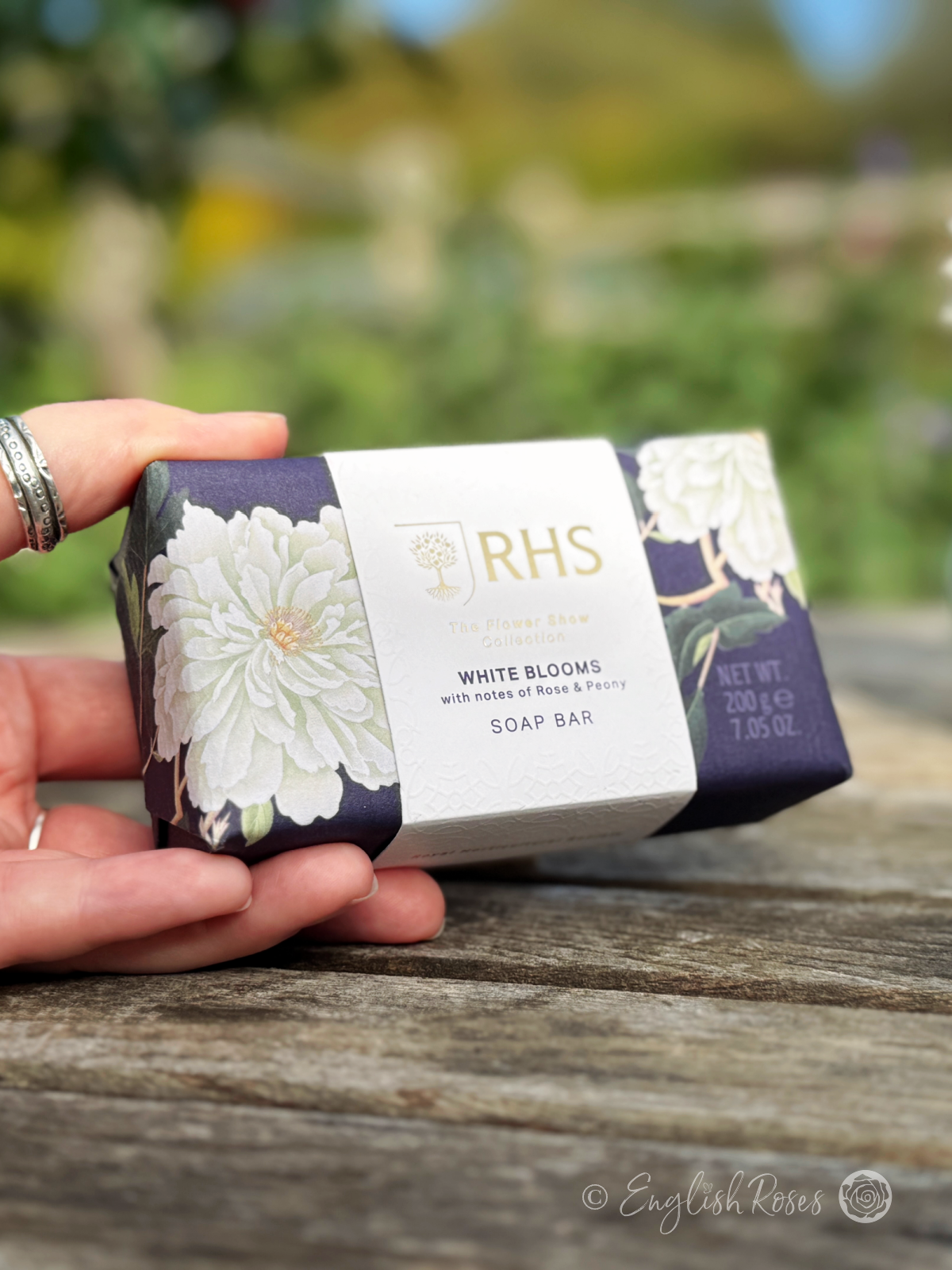 Soap Bar - White Blooms Rose and Peony RHS The Flower Show Collection - A hand holding the White Blooms bar of soap from the RHS