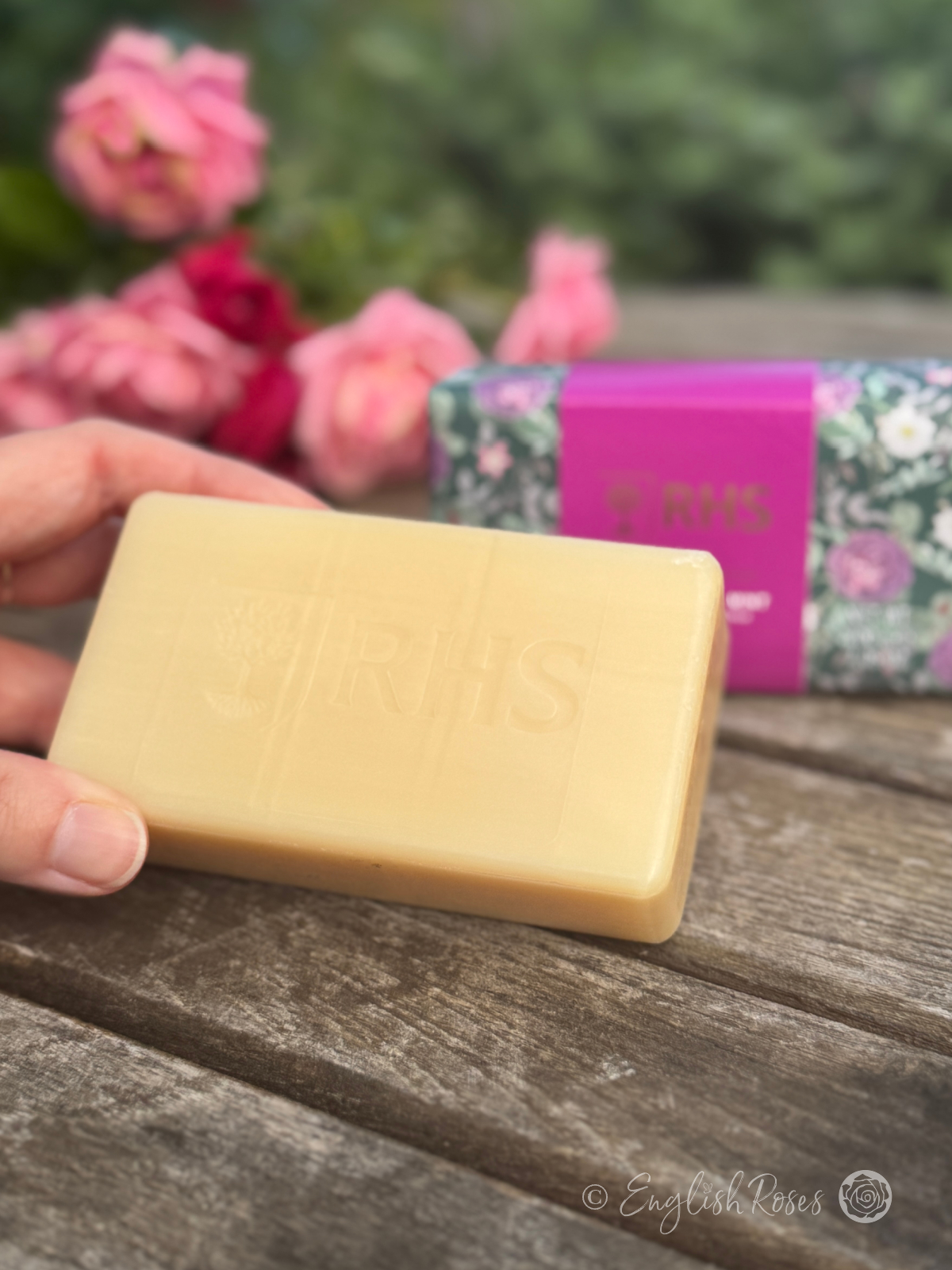 Soap Bar - Wild Rhubarb and Mint RHS The Rewild Collection - A hand holding the large bar of soap