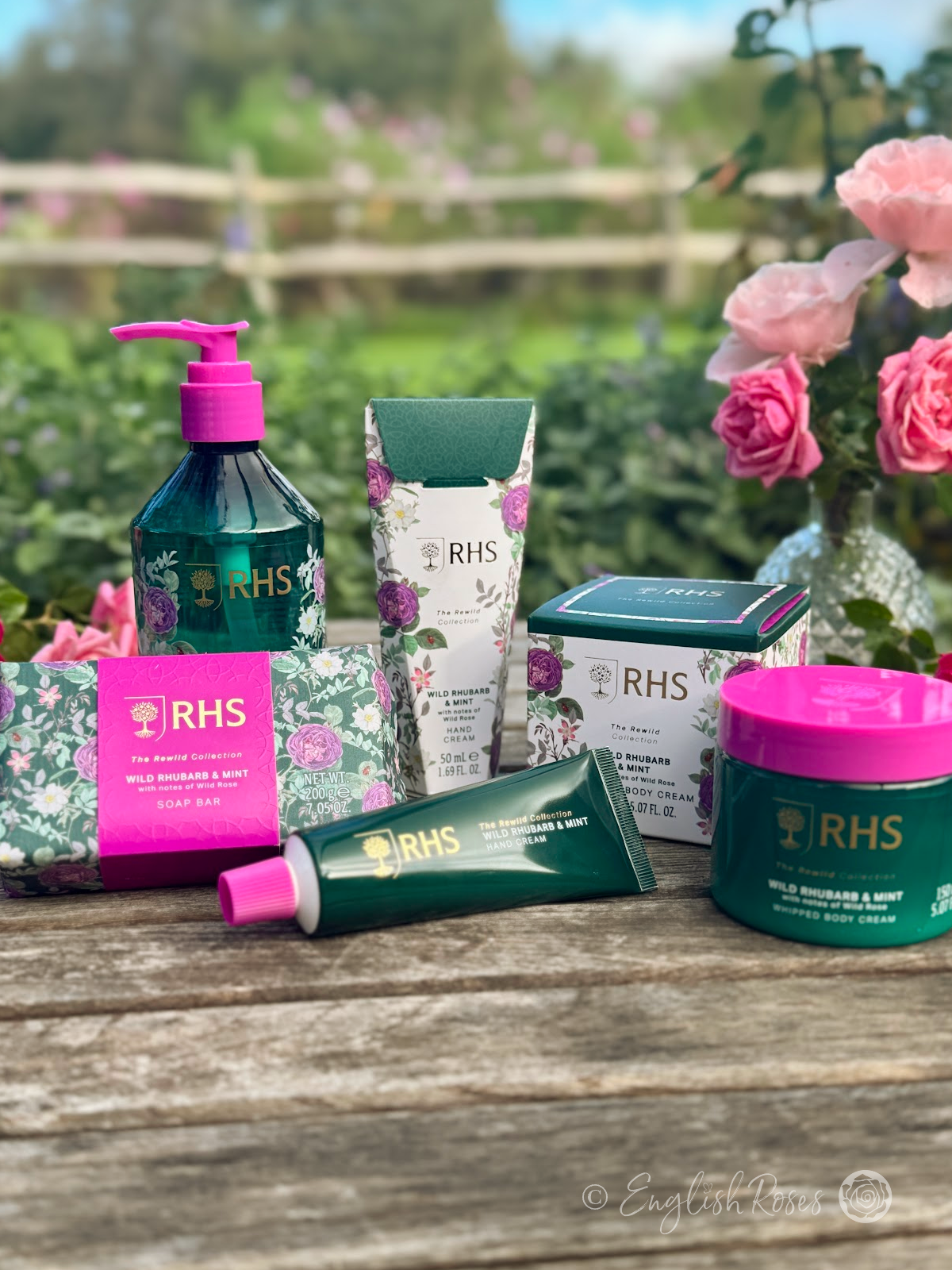 Wild Rhubarb and Mint RHS The Rewild Collection - The collection of products including hand cream, soap bar, hand wash and body cream win beautiful packaging.